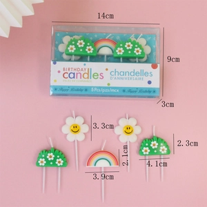 Detail showing dimensions of birthday candles with rainbow and flower shapes in packaging