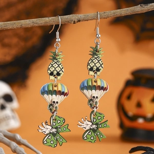 Halloween drop earrings featuring skull pineapple and bow design on rustic branches