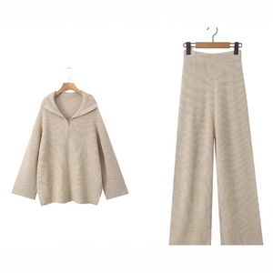 Women's beige knit two-piece set with half-zip sweater and high-waist wide-leg pants