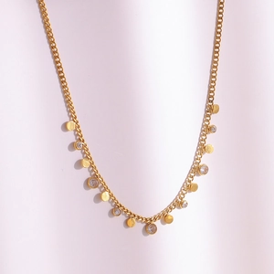Detailed close-up of 18K gold plated stainless steel chain with round zircon charms