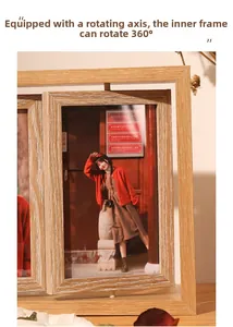 Detail showing the 360-degree rotating axis on a light wood grain double-sided frame