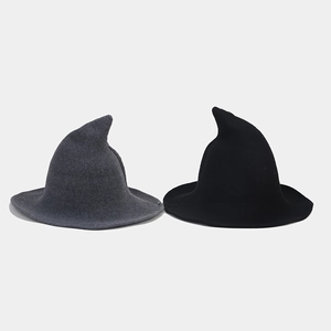 Detailed knit texture of foldable black and grey pointed wizard hats with wide brims