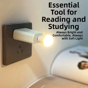 Minimalist portable LED USB night light plugged into a wall outlet for reading