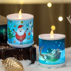LED Christmas candle lights with Santa and reindeer prints on a snowy festive background