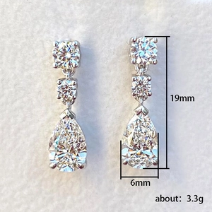 Classic silver teardrop earrings with pear-cut cubic zirconia for brides, size 19x6mm
