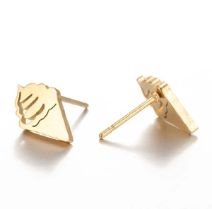 Macro view showing detailed golden guild symbol stud earrings on a white background