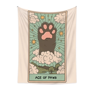 Bohemian tarot style wall tapestry featuring Ace of Paws design with cat paw and landscape