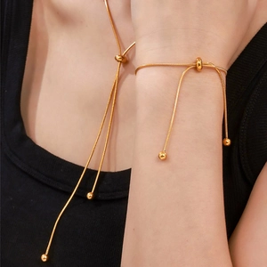 Elegant 18K gold-plated snake chain necklace and bracelet set with adjustable beads