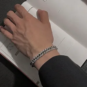 Silver Cuban link bracelet in titanium steel, stylish hip-hop accessory for men and women
