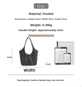 Detail view of suede tote bag dimensions and capacity comparison with iPad and A4 paper