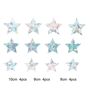 Detail view of 12 holographic star window clings in 10cm, 9cm, and 8cm sizes