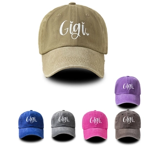 Close-up of Gigi embroidery on a washed cotton baseball cap with vintage finish