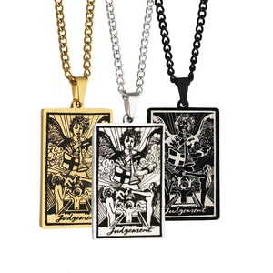 Three tarot Judgement pendant necklaces in gold, silver, and black on white background