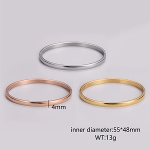 Detail view of 4mm minimalist metal bangles in silver, rose gold, and gold plating