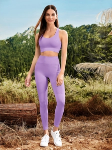 Detailed texture of lavender purple ribbed yoga set featuring breathable mesh structure