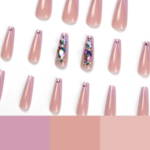 Pink press on nails with purple V-shaped French tips and luxury rhinestone crystals