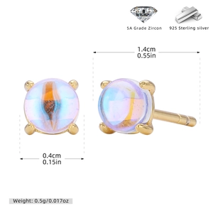 Detail view of 925 silver stud earrings with light blue 5A zircons and gold plating