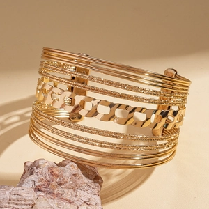 Polished gold multi-layer open cuff bracelet with Cuban chain and sandblasted texture