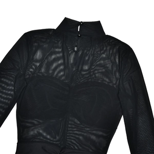 Close-up of black mesh patchwork dress featuring a high neck and back button closure
