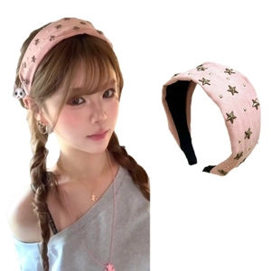 Pink fabric headband with gold star rivets and studs in a minimalist striped knit style