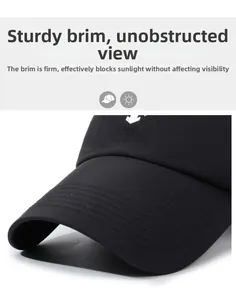 Close-up of the stiff brim on this black baseball cap with fine stitching and embroidery