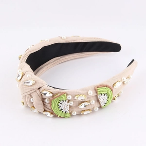 Détails du serre-tête noué large avec des strass et un motif de kiwi en perles