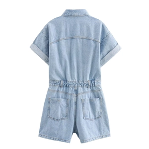 Detail of light blue denim romper featuring back patch pockets and high waist elastic band