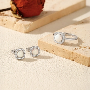Elegant S925 silver jewelry set featuring round opal halo ring and matching stud earrings