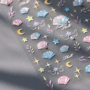 3D ocean shell nail stickers with holographic pearl finish and starfish patterns