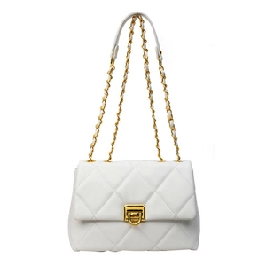 White quilted leather crossbody bag with gold chain and flap closure on white backdrop