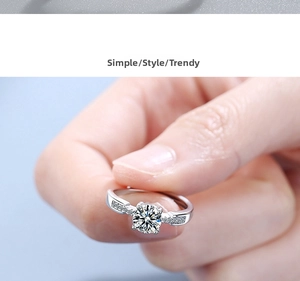 Macro shot of a minimalist silver six-prong ring with sparkling zircon stones and micro-pave