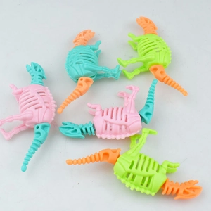 Detailed view of colorful DIY dinosaur skeleton assembly toys in various vibrant pastel colors
