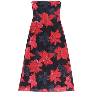 Detail view of the elegant tube maxi dress featuring vibrant red lily floral print on black fabric