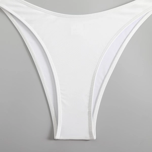 Detail of high-density elastic white bikini bottom fabric with smooth stitching