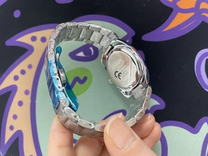 Detail of PINTIME stainless steel back and watch clasp with water resistant engraving
