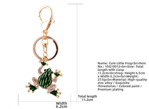Detailed view of the cute green frog keychain showing dimensions and rhinestone details