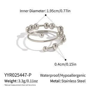 Dettaglio anello anti-stress con perle mobili, fascia in acciaio inox da 1,95 cm