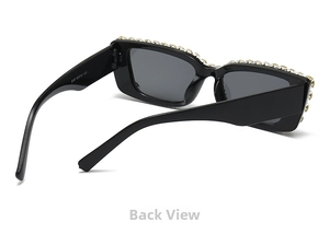 Detail showing the black square sunglasses frame with rhinestone accents on the top edge