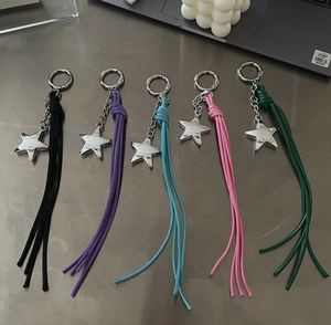 Five colorful Y2K star charms with long tassels and silver metal rings for bags