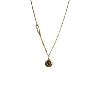 Golden sunburst tiger eye necklace with minimalist toggle chain and crystal accents