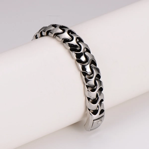 Polished silver stainless steel link chain bracelet with industrial S-shaped curve links
