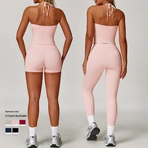 Pink halter backless yoga set with high waist compression shorts and leggings for women