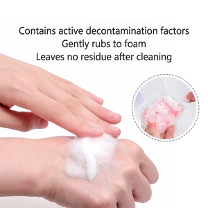 Portable pink petal soap sheets in box producing rich white foam for travel use