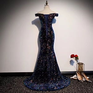 Elegant off-shoulder navy sequin mermaid evening gown with a stylish lace-up back