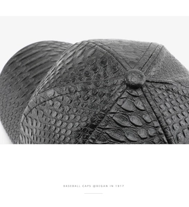 Detailed top view showing the black faux crocodile skin texture on a baseball cap