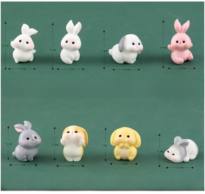 Detail of 8 mini resin rabbit figurines in various poses with precise height and width measurements