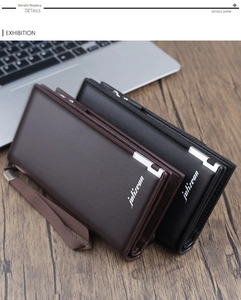 Long leather wallets in black and brown featuring zipper closure and side wristlet strap