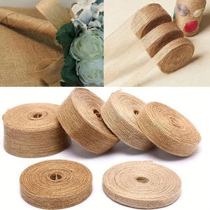 Various widths of natural jute burlap ribbon rolls for DIY gift wrapping and wedding decor