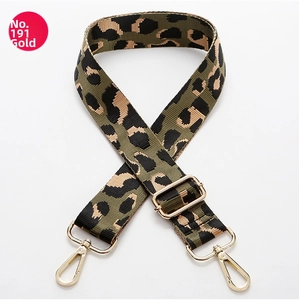 Adjustable leopard print bag strap with wide nylon fabric and gold metal lobster clasps