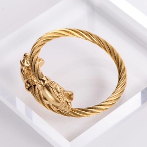 Adjustable golden stainless steel cable cuff bracelet with leopard head design